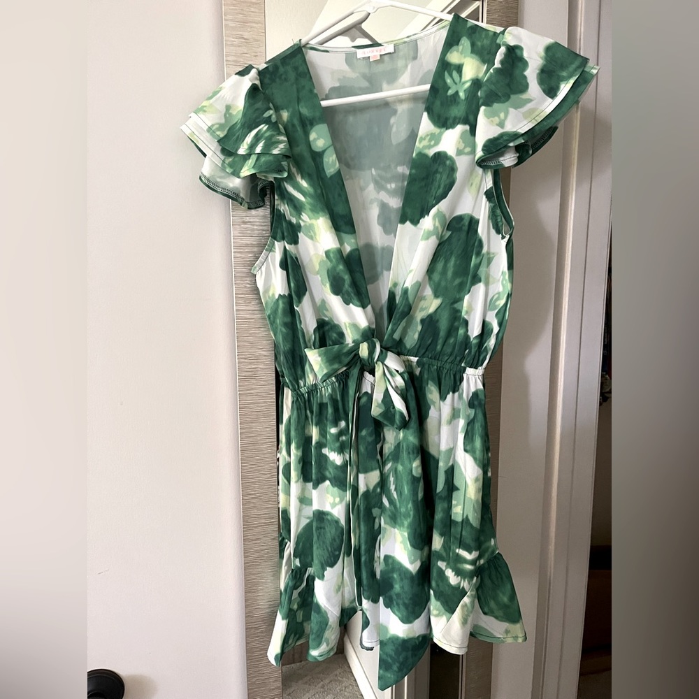 Green/white printed, low V romper.